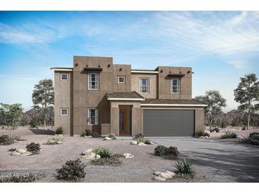 Modern two-story home featuring a two-car garage, desert landscaping, and a neutral color palette against a blue sky at 23064 E Watford Dr, Queen Creek, AZ 85142