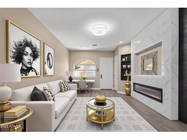 Bright living room features a sleek fireplace, modern decor, and sophisticated furnishings at 1367 S Country Club Dr # 1320, Mesa, AZ 85210