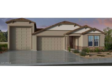 Inviting single-Gathering home displaying a neutral color palette, well-manicured lawn, and a spacious three car garage at 16784 W Whispering Wind Dr, Surprise, AZ 85387