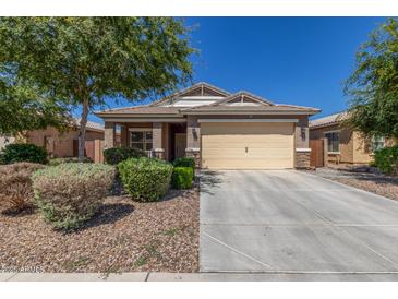 Charming single-story home featuring a two-car garage, desert landscaping, and a well-maintained front yard at 2368 E Bellerive Dr, Gilbert, AZ 85298