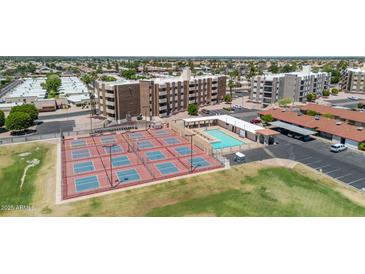 An aerial view of community amenities including pickleball courts and pool at 515 S Parkcrest -- # 531, Mesa, AZ 85206