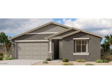 Beautiful single-Gathering home featuring a two-car garage, neutral color palette, and desert landscaping at 32661 N Newby Dr, San Tan Valley, AZ 85143