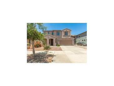 Two-story home with desert landscaping, covered entry, and two car garage at 11834 N 147Th Ln, Surprise, AZ 85379