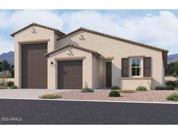 Inviting single-story home with a two-car garage, neutral stucco facade, and meticulously landscaped front yard at 2639 E Rustler Rd, San Tan Valley, AZ 85140
