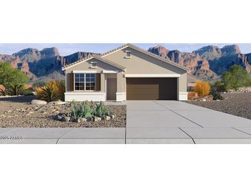 Charming single-story home with desert landscaping and a two-car garage, set against a scenic mountain backdrop at 22530 N Lynn St, Maricopa, AZ 85138