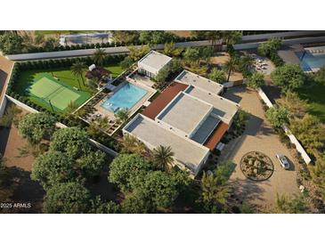 Expansive property with a pool, tennis court, and modern architecture surrounded by mature trees and landscaping at 13202 N 76Th Pl, Scottsdale, AZ 85260