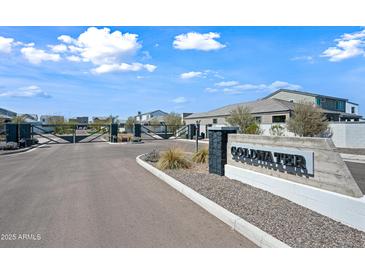 Gated Coldwater community entrance with well-maintained landscaping and clear signage on a sunny day at 2324 E Marguerite Ave, Phoenix, AZ 85040
