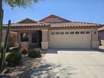 Charming single-story home with a tile roof and a two-car garage at 4255 E Rock Dr, San Tan Valley, AZ 85143