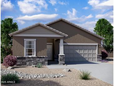 Charming single-story home with stone accents, a covered porch, and a two-car garage at 11657 N Siders Ln, Maricopa, AZ 85139