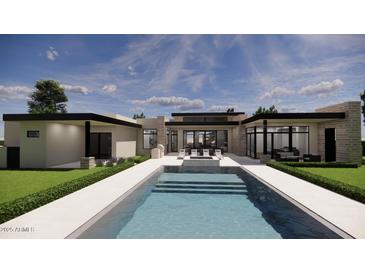 Inviting pool area with modern outdoor seating and sleek architectural design against a bright sky backdrop at 14034 N 81St St, Scottsdale, AZ 85260