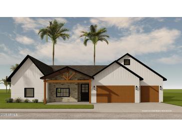 Beautiful single-story home featuring a stone-clad entryway, a neutral palette, and an attached two-car garage at 3913 E Campbell Ave, Phoenix, AZ 85018