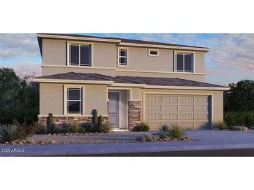 Two-story home showcasing neutral stucco, decorative stone accents and a two car garage at 16810 W Yucatan Dr, Surprise, AZ 85388