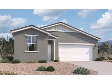 Charming single-story home with gray stucco exterior and a well-manicured, low-maintenance front yard at 47451 W Kenner Dr, Maricopa, AZ 85139