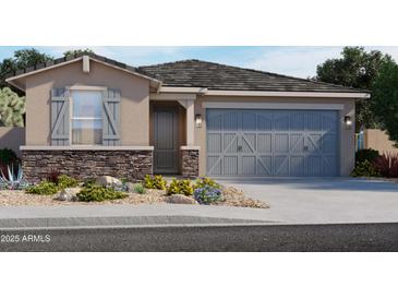 Charming single-Gathering home featuring stone accents, a two-car garage, and professionally landscaped front yard at 16005 W Bronco Trl, Surprise, AZ 85387