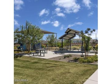 Enjoy the outdoors with picnic tables and playground structures in this lovely community park setting at 21167 E Arrowhead Trl, Queen Creek, AZ 85142