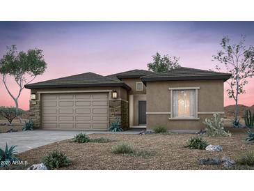 Inviting single-story home featuring a two-car garage and desert landscaping at 42925 W Palo Amarillo Rd, Maricopa, AZ 85138