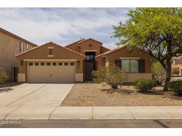 Charming single-story home with a two-car garage, desert landscaping, and a welcoming entryway at 3843 E Citrine Rd, San Tan Valley, AZ 85143