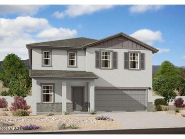 Charming two-story home showcasing modern design, neutral colors, and a convenient two-car garage at 5824 W Willow Ridge Dr, Laveen, AZ 85339