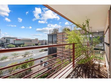 Balcony view with steel and wood construction, view of city with blue sky at 7157 E Rancho Vista Dr # 5004, Scottsdale, AZ 85251
