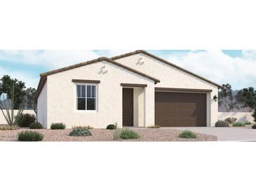 Charming single-story home featuring a two-car garage and neutral color palette at 15785 W Beryl Ave, Waddell, AZ 85355