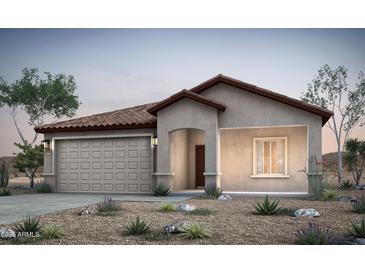 Charming single-story home features a tiled roof, two-car garage, and desert landscaping at 42930 W Palo Amarillo Rd, Maricopa, AZ 85138