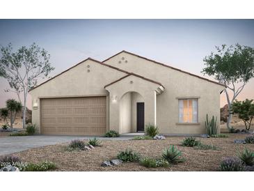 Inviting single-story home featuring a two-car garage and desert landscaping in a neutral color palette at 42945 W Palo Amarillo Rd, Maricopa, AZ 85138