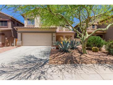 Charming two-story home with a desert landscape and a two car garage at 4516 W Fortune Dr, Phoenix, AZ 85086