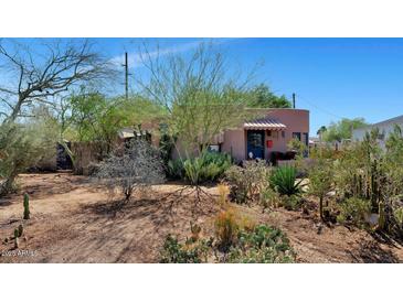 Charming desert home featuring a unique facade and native landscaping in a vibrant neighborhood at 2545 N 14Th St, Phoenix, AZ 85006