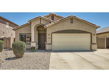 Charming single-Gathering home with a well-maintained yard, two car garage, and welcoming entrance at 2853 E Cathy Dr, Gilbert, AZ 85296