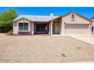 Charming single-story home with stucco siding, well-maintained landscaping, and a two-car garage at 722 W Topeka Dr, Phoenix, AZ 85027
