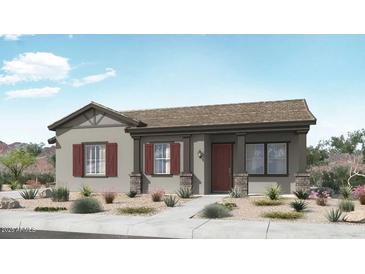 Charming single-story home featuring a neutral color palette, well-manicured landscaping, and inviting entryway at 14655 W Sand Hills Rd, Surprise, AZ 85388