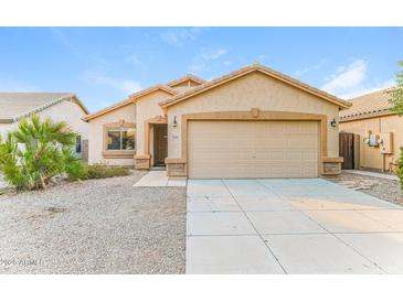 Charming single-story home with a two-car garage, desert landscaping, and a welcoming facade at 2783 E Mineral Park Rd, San Tan Valley, AZ 85143