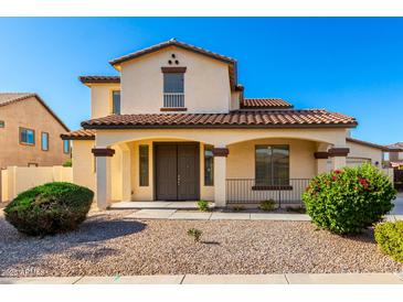 Charming two-story home with a welcoming front porch and desert landscaping at 21538 E Alyssa Ct, Queen Creek, AZ 85142
