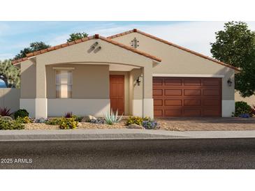 Beautiful single-story home featuring a covered entry, desert landscaping, and a two-car garage at 17567 W Pierson St, Goodyear, AZ 85395
