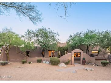 Charming single-story home featuring a neutral stucco exterior, desert landscaping, and a private entrance at 3405 E Knox Rd, Phoenix, AZ 85044