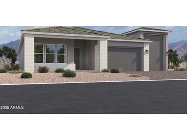 Charming single-story home featuring a two-car garage, xeriscaped yard, and covered front porch at 22937 E Twin Acres Dr, Queen Creek, AZ 85142