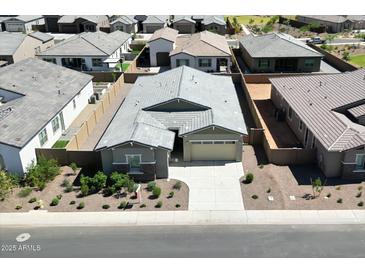 Charming aerial view of a home boasting manicured landscaping in a serene neighborhood at 3885 E Kenley Ln, San Tan Valley, AZ 85143