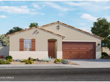 Charming single-story home with a two-car garage, desert landscaping, and a warm, inviting facade at 16004 W Honeysuckle Dr, Surprise, AZ 85387