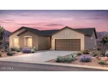 Charming single-story home featuring a two-car garage, neutral-toned exterior, desert landscaping, and a concrete driveway at 6694 W Ripken Ct, Florence, AZ 85132