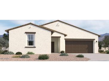 Beautiful single-story home with a well-maintained landscape and a two-car garage at 47214 W Cansados Rd, Maricopa, AZ 85139