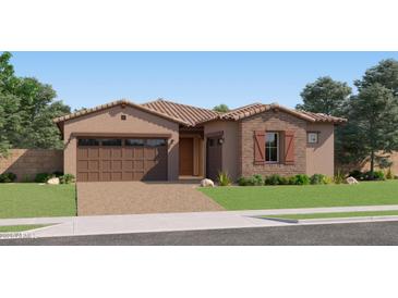 Charming single-story home with a two-car garage, brick accents, and desert landscaping at 7854 W Tether Trl, Peoria, AZ 85383