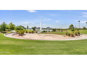 Scenic view of the community park with a water feature, ample green space, and a large event staging area at 14910 N Kings Way # 206, Fountain Hills, AZ 85268
