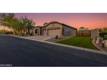 Charming single-Gathering home with a well-manicured front yard, desert landscaping and a spacious three-car garage at 1753 N Berrett --, Mesa, AZ 85207