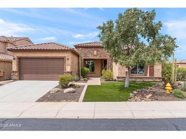 Beautiful single-story home with desert landscaping, tile roof and inviting curb appeal at 5650 E Ocupado Dr, Cave Creek, AZ 85331