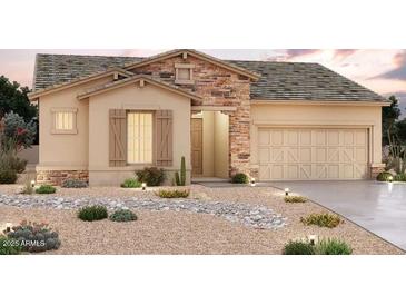 Charming single-story home featuring stucco siding, stone accents, and a well-manicured desert landscape at 11002 N 164Th Dr, Surprise, AZ 85388