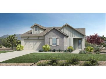 Charming single Gathering home with a two-car garage, neutral brick accents and well-manicured landscaping at 6122 S Antonio --, Mesa, AZ 85212