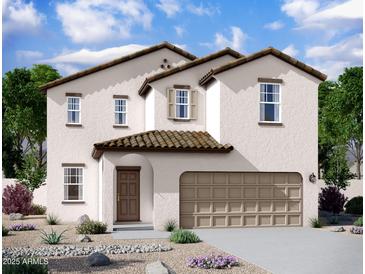 Charming two-story home with a covered entry and a two car garage at 47220 W Coe St, Maricopa, AZ 85139