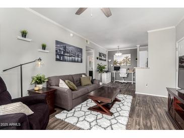 Comfortable living room with modern decor, featuring a plush sofa and inviting textures at 29606 N Tatum Blvd # 245, Cave Creek, AZ 85331