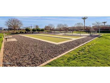 Outdoor bocce ball court with manicured gravel and grass at 3634 E Perkinsville St, Gilbert, AZ 85295