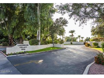 Welcome to Lakebrook Villas I. A quiet community with mature trees, meticulous landscaping, and block wall construction at 11026 N 28Th Dr # 34, Phoenix, AZ 85029